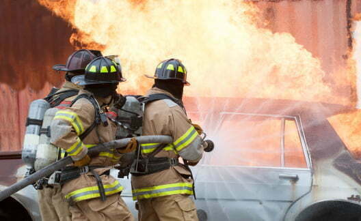 firefighters putting out electrical car fire