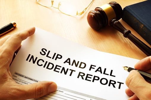 lawyer with gavel filing a slip and fall injury claim