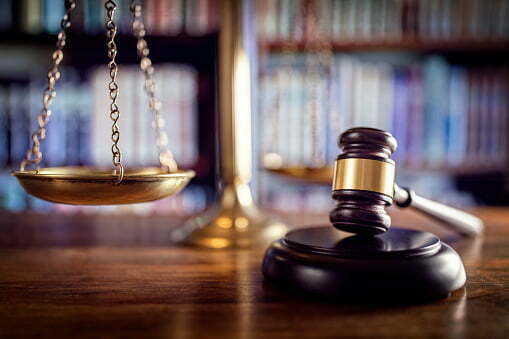judge gavel and justice scale on desk for mass tort litigation