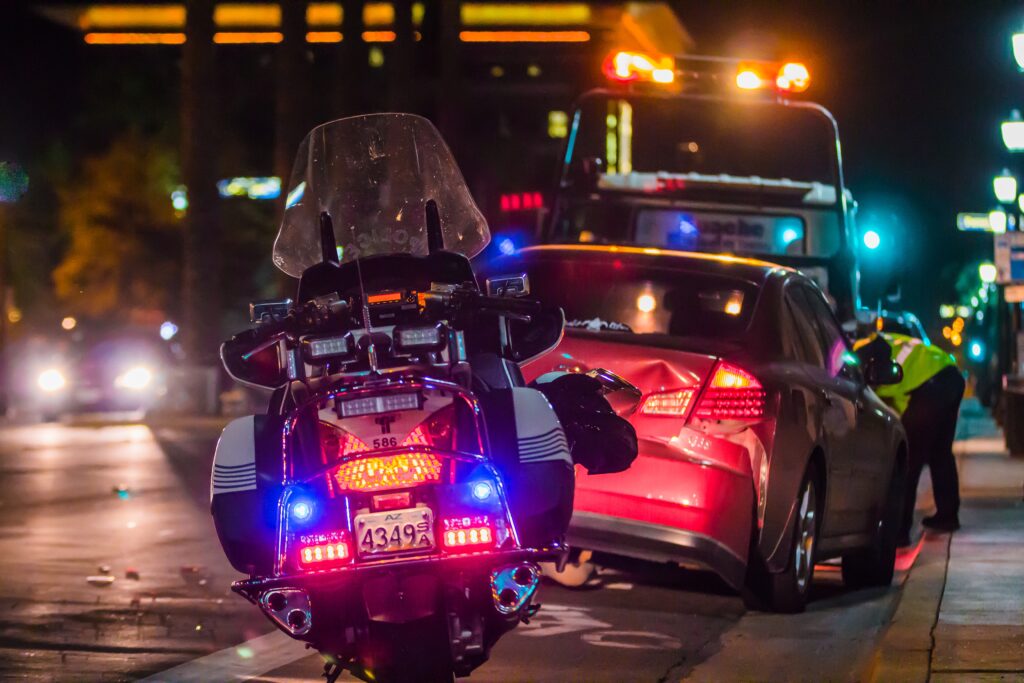 motorcycle behind damaged car after new york city motorcycle accident