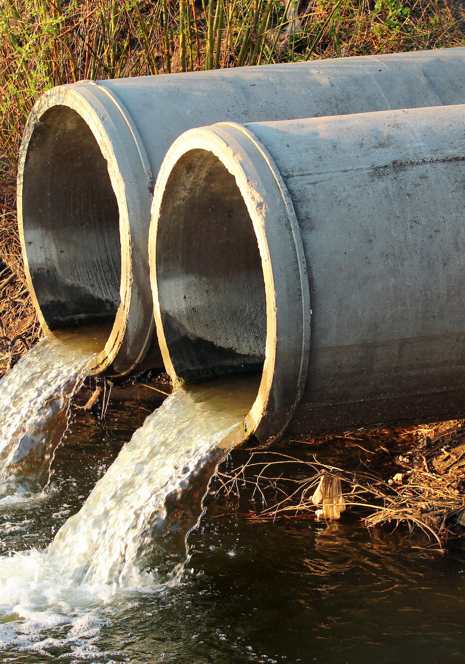 Discharge of sewage into a river